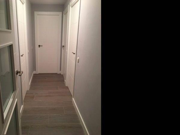 Reforma de vivienda en Terrassa diseñada por Contemporánea - puertas